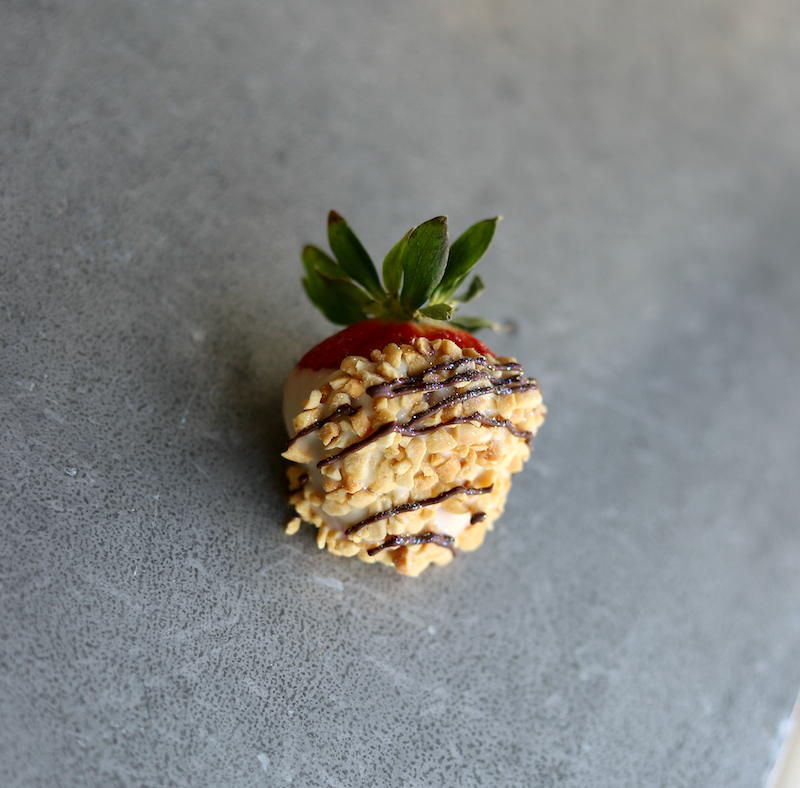 White Chocolate covered Strawberries with Peanuts